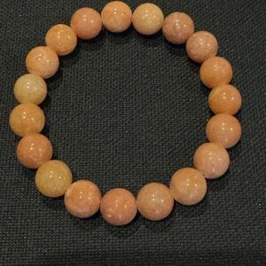 Orange Calcite 8mm
7-7.5”